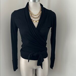 Costa Blanca Elegant Black Wrap Top